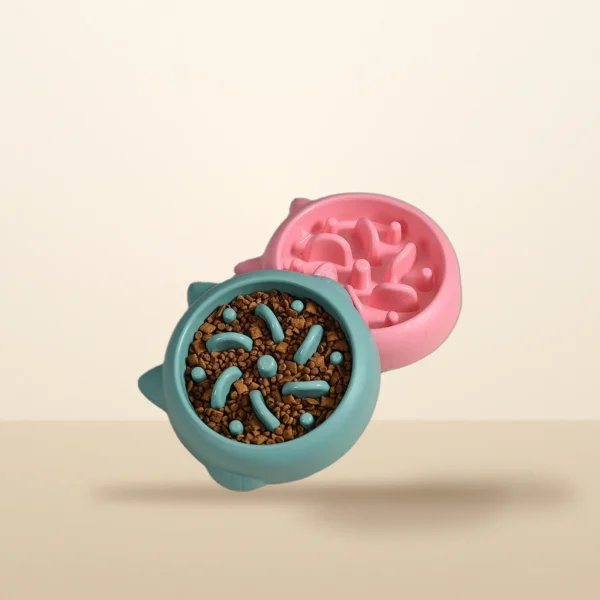 Slow feeder dog bowls, one filled with kibble
